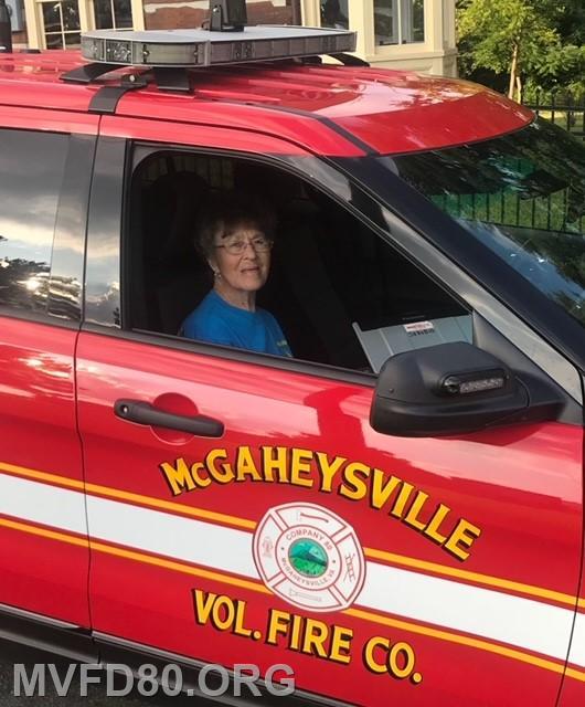 Ladies auxiliary charter member Billie Hensley riding in parade